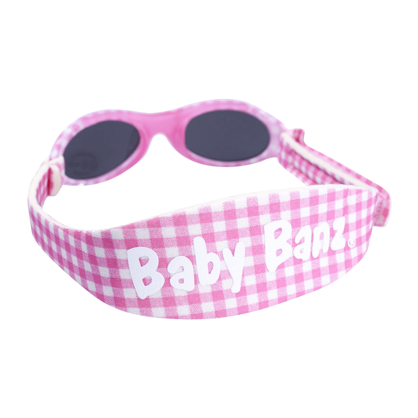 Baby Banz / Kidz Banz solglasögon för barn och baby. Rutigt mönster i rosa och vitt.